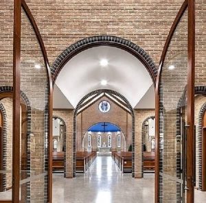 Arch hallway brick wall design