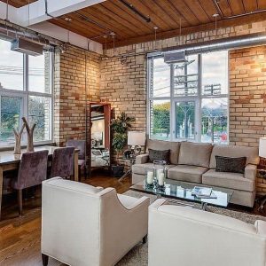 Living room decoration with brick walls and timber combo