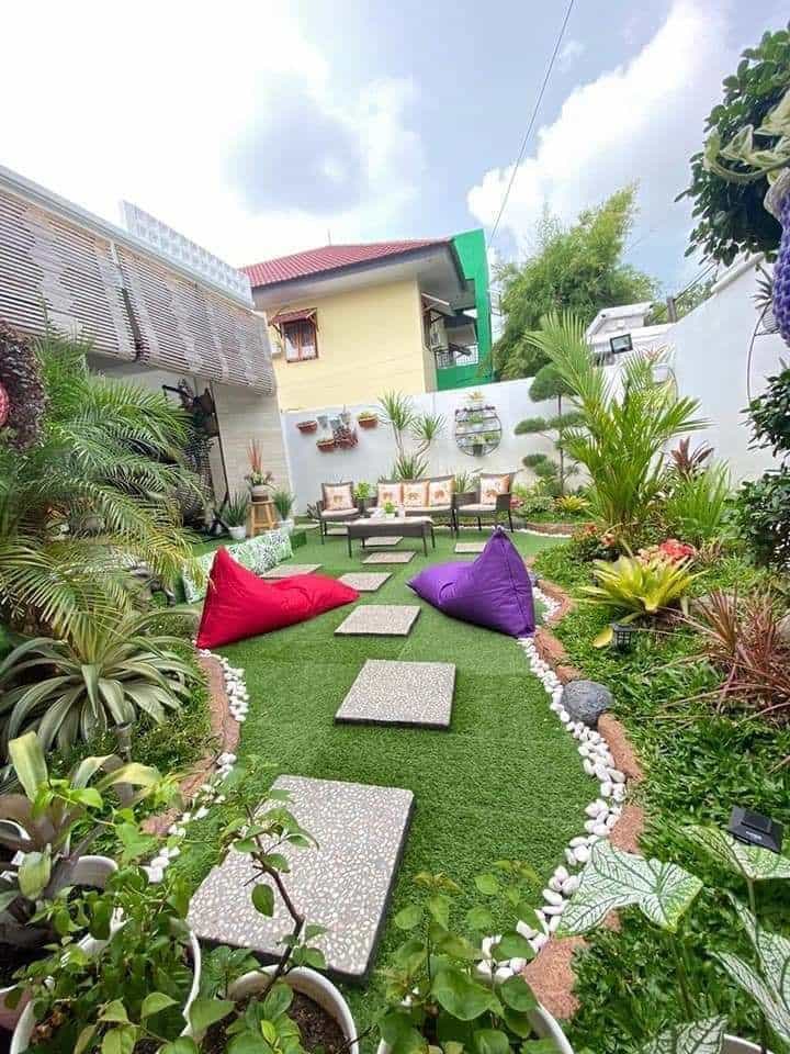 Gathering Area with Artificial Grass in a Residential Landscape