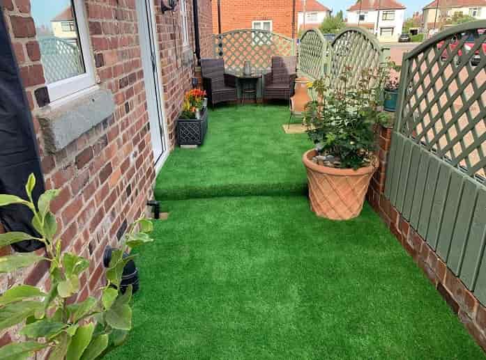 Small garden with exposed bricks