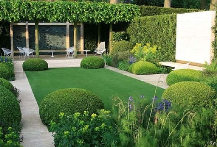 A vertical garden with greeny elements and artificial grass