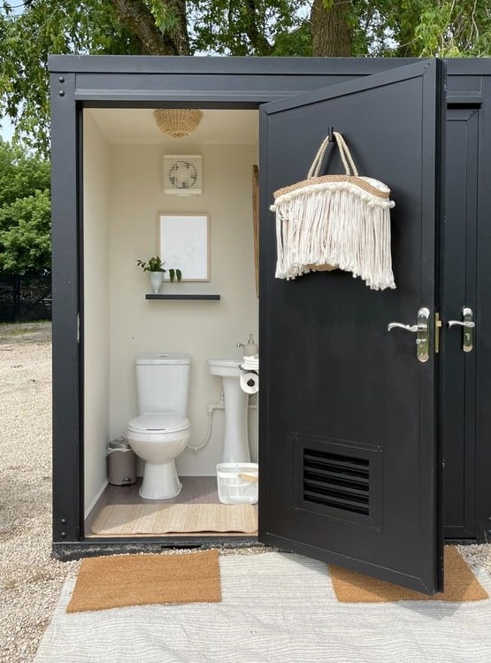 Shipping container outdoor pool bathroom