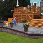 Custom built wood deck and stone patio
