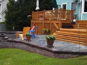 Custom built wood deck and stone patio