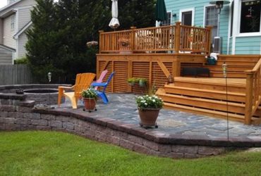 Custom built wood deck and stone patio
