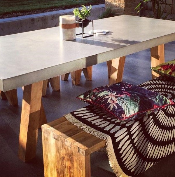 Classic concrete top dining table with wood legs as the base
