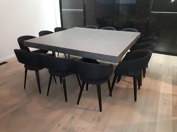 Large concrete dining table with twelve seater