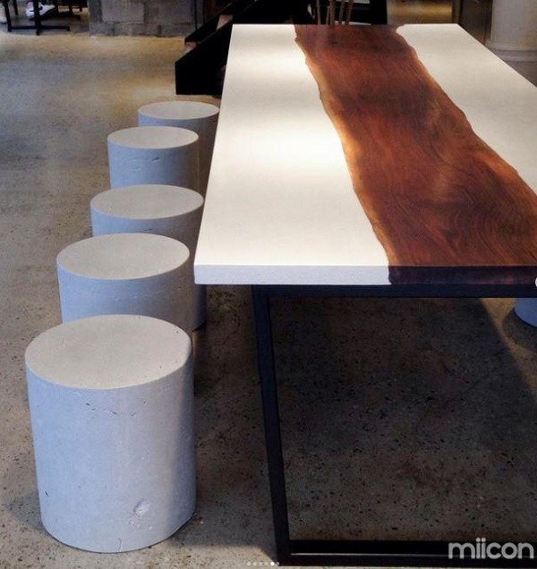 White concrete dining table with wood for ten