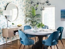 Round concrete top dining table with antique wood base