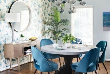 Round concrete top dining table with antique wood base