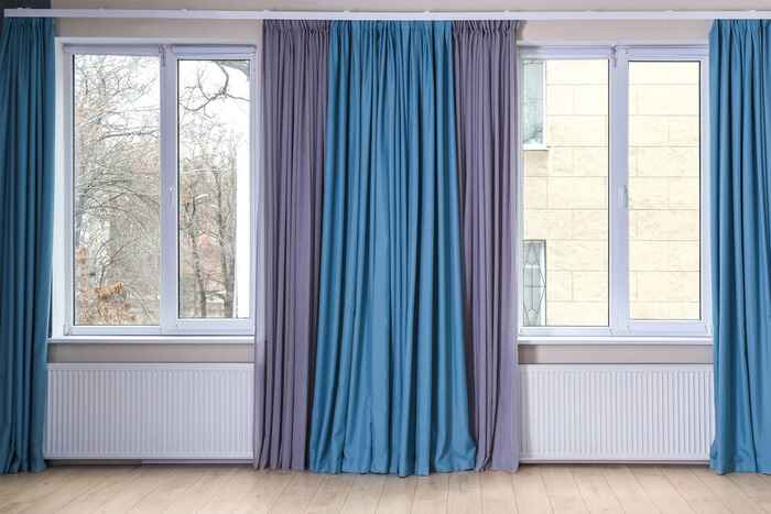 Windows with color blackout curtains