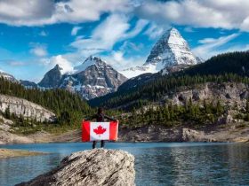 A Girl holding a Canadian national flag