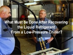 What must be done after recovering the liquid refrigerant from a low-pressure chiller?